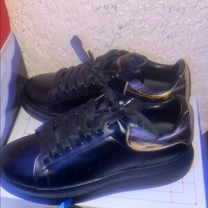 Alexander McQueen Black and Gold Sneakers